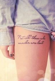 girl's legs beautiful English letter tattoo