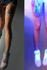 beautiful thigh fluorescent tattoo