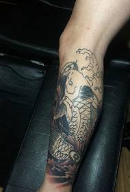 hidden in small Small squid tattoo on the leg