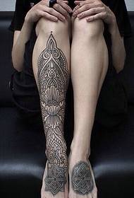 a stylish Indian Henna tattoo on the calf
