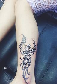 simple phoenix tattoo in the calf