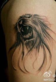 Leg lion tattoo