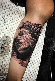 Ink portrait tattoo image of calf