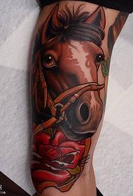 Red horse tattoo pattern on the leg