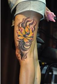 Beautiful looking stream cloud style lotus tattoo picture on beautiful thigh