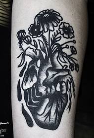 Calf thorn heart blossom tattoo pattern