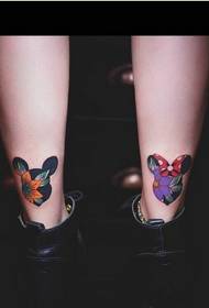Female legs beautiful Mickey bow flower tattoo picture picture