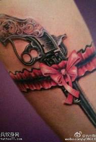Beautiful bow small pistol tattoo pattern