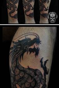 Tankou modèl la tatoo dragon an