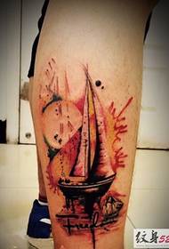 Nice looking sailing tattoo on the calf