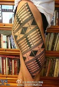 Geometric tattoo pattern on the thigh