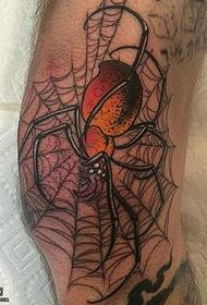 Spider web tattoo pattern on the legs