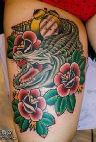 Thigh flower crocodile tattoo pattern