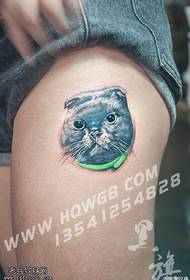 Cat tattoo pattern on the thigh