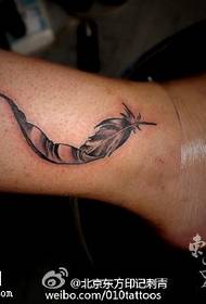 Elegant and delicate feather tattoo pattern