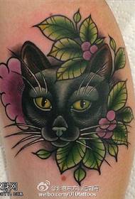 Cat floral tattoo pattern on calf