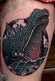 Thigh dinosaur tattoo pattern