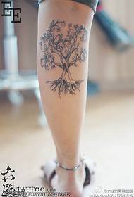 Leg thorny lush tree of life tattoo