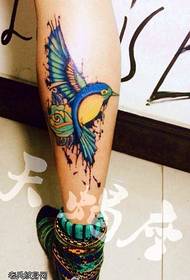 Leg splashing rose hummingbird tattoo pattern