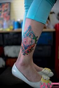 Little white rabbit eat radish creative leg tattoo pictures