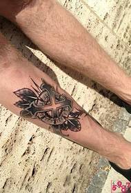 Cross and flower leg tattoo pictures