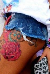 a female leg color rose tattoo pattern picture