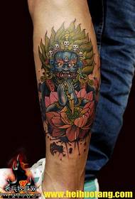 Leg holding dagger lotus diamond tattoo pattern