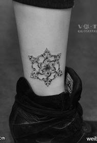 Abstract crystal snowflake tattoo pattern