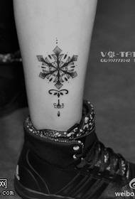 Delicate and elegant snowflake tattoo pattern