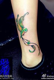 Leg color bird tattoo pattern