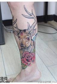 Leg color antelope rose tattoo pattern