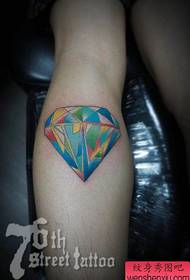 Popular colorful diamond tattoos on the legs