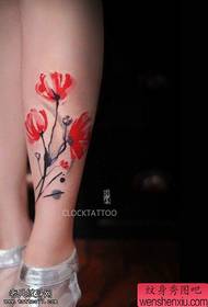 Woman legs colored poppies tattoo pictures