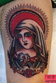 a leg of the Virgin Mary tattoo