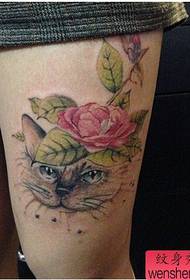 Woman legs cat rose tattoo tattoo works