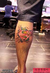 Leg color superman logo tattoo work