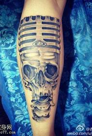 The leg creative skull tattoo works are shared by the tattoo show
