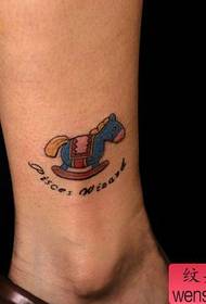 a leg colored wooden horse tattoo pattern