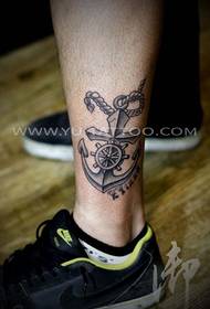 A leg anchor tattoo work is shared by the tattoo shop