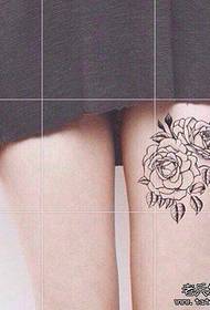 Woman legs rose tattoo tattoo