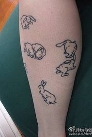 Simple and cute bunny tattoo pattern on the legs