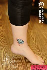 Small and popular diamond tattoo pattern at girls' ankles