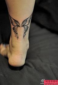 Woman leg totem butterfly tattoo work