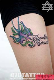 Girlish thighs nice looking colorful little swallows with letter tattoo pattern