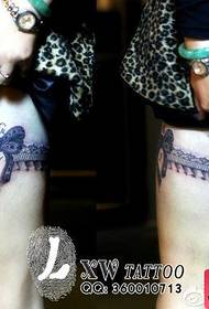 Beautiful lady's legs are popular with a very cute lace tattoo pattern