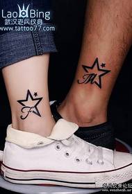 Couple leg tattoo pentagram english alphabet tattoo