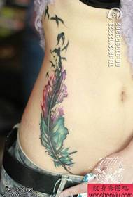 Woman's side waist color feathered Yan tattoo works