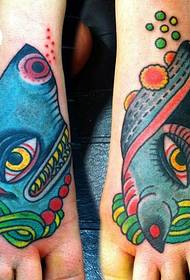 Couple legs fish tattoo works