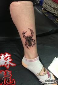 A colorful spider tattoo pattern with beautiful legs