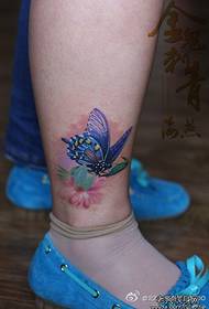 Ganska cool färgfjärils tatuering mönster för kvinnor ben